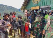 Satgas Yonif 715/Mtl Gelar Makan Bersama Warga di Talilime
