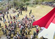 Merah Putih Raksasa Berkibar di Bukit Zaitun: Suara Persatuan dari Puncak Jaya