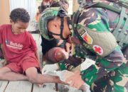 Satgas Yonif 715/Mtl Layani Kesehatan Dengan Sentuhan Kasih